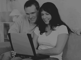 Couple Conducting a Reverse Cell Phone Number Look Up